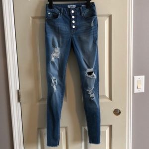 High-rise distressed skinny jeans